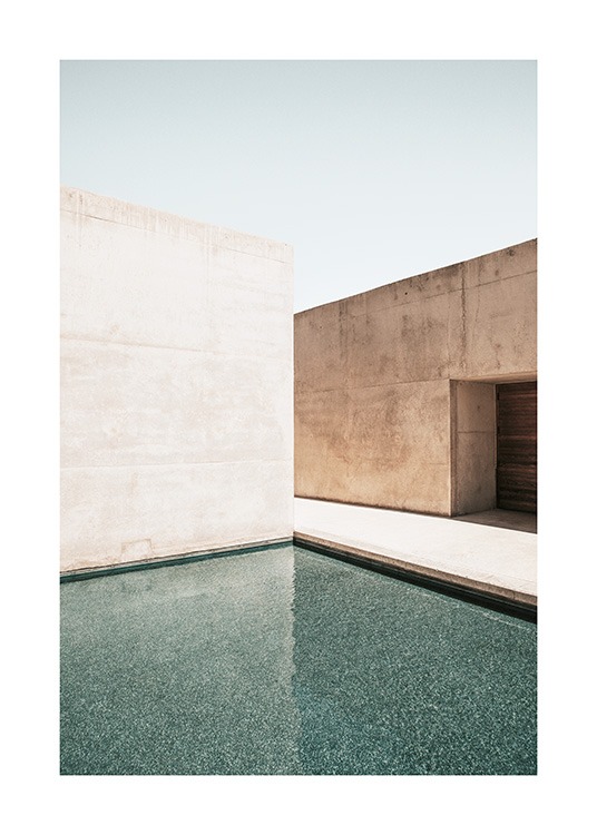  – Fotografi av betongbyggnader med en stor pool framför