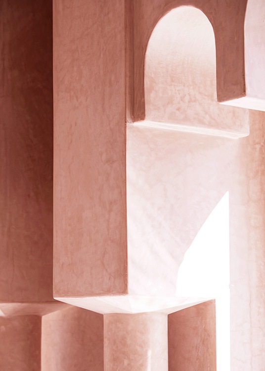  - Fotografi med detaljer från en betongbyggnad i rosa med små valv och pelare